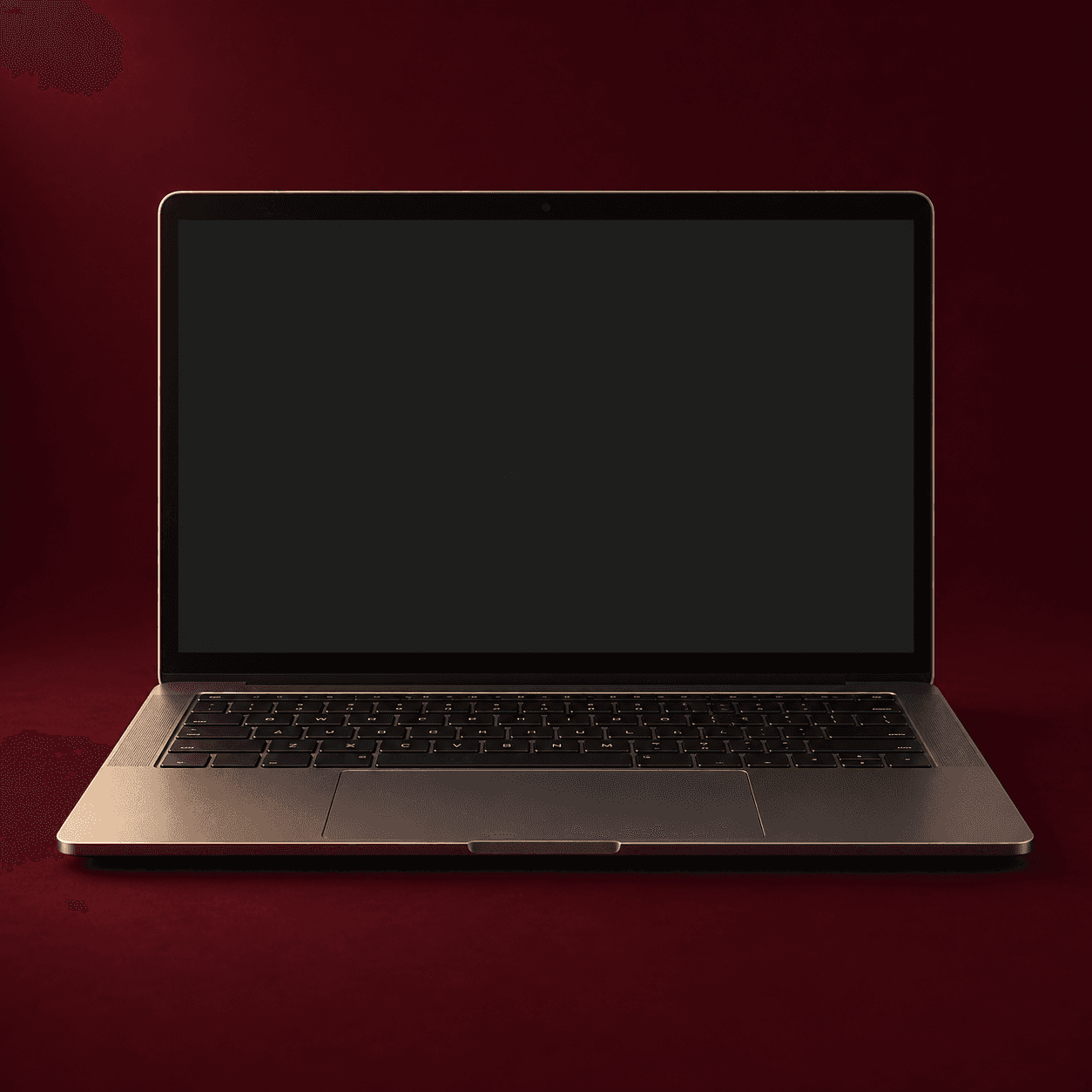 Graphite laptop with warm gold reflections